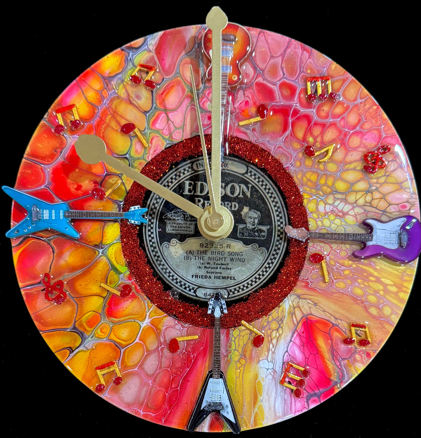 Clocks created from repurposing Edison records circa 1900’s. Each clock is painted using acrylic Bloom process. After the clocks have been created in various themes, they are coated in high quality resin for protection. We also do commissions.