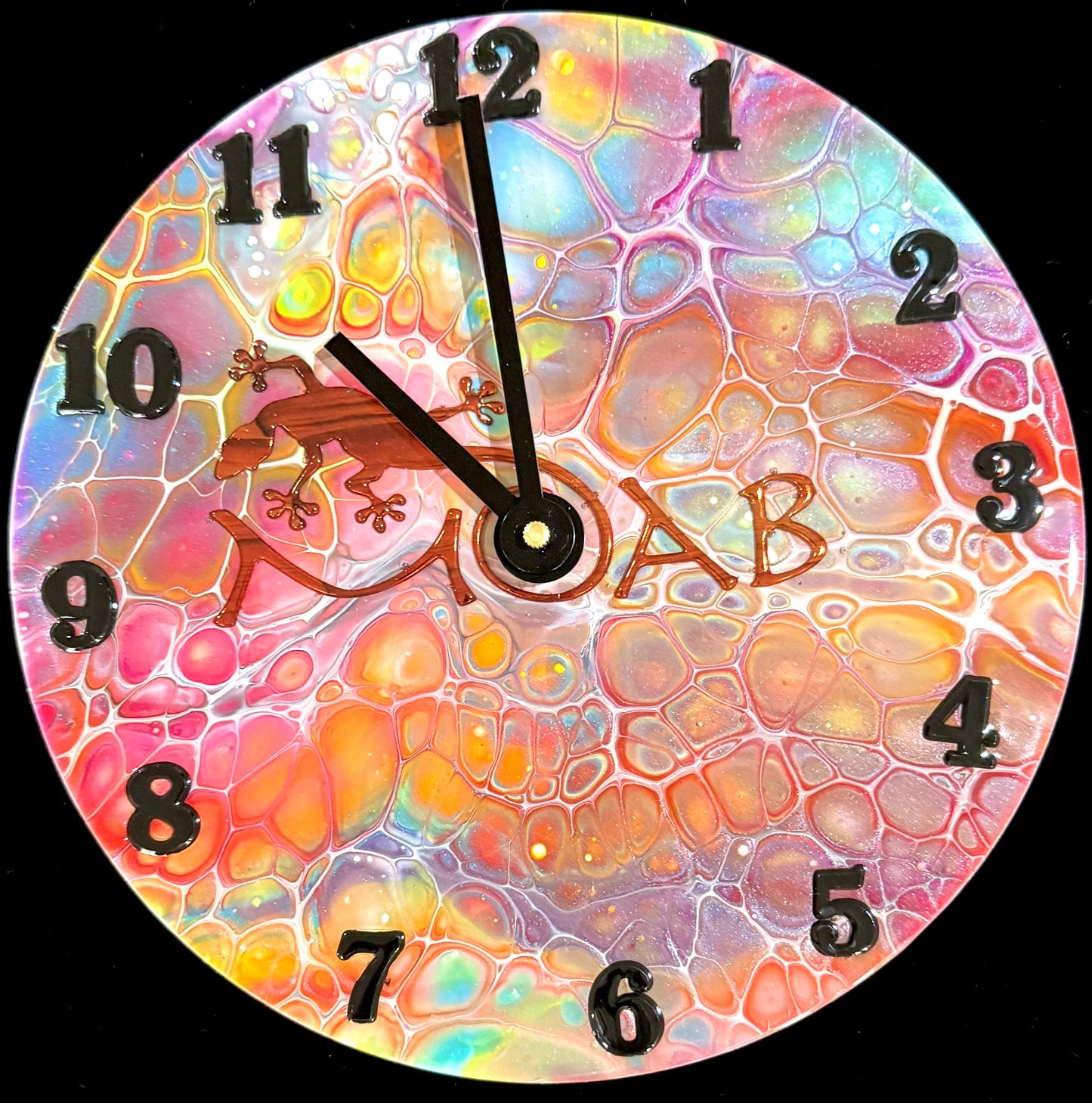 Clocks are created from Edison records circa 1900’s. The records are painted with acrylic paint using the Bloom process. After decorating in various themes, the records are coated with high quality resin to protect the record.