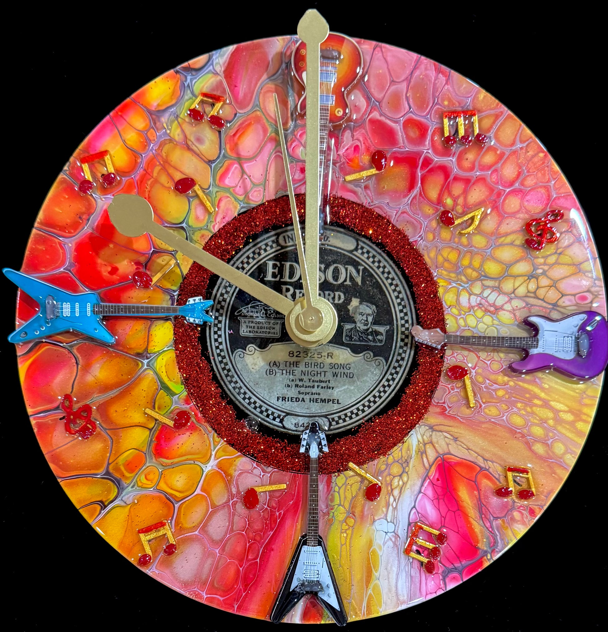 Clocks created from repurposing Edison records circa 1900’s.  Each clock is painted using acrylic Bloom process.  After the clocks have been created in various themes, they are coated in high quality resin for protection.  We also do commissions.
