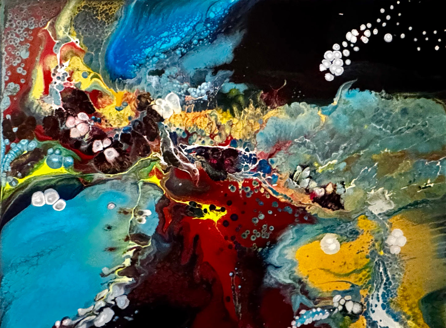 36 x 48 fluid acrylic painting created in the pearl process.  I love the many colors of blues, warm reds, yellows, darks and lights.  But more I love the blending and movement, the life within the painting.  I named the painting Benthic because that is the lowest part of a body of water whether river, lake, ocean.  It is also the life rich zone found underwater.