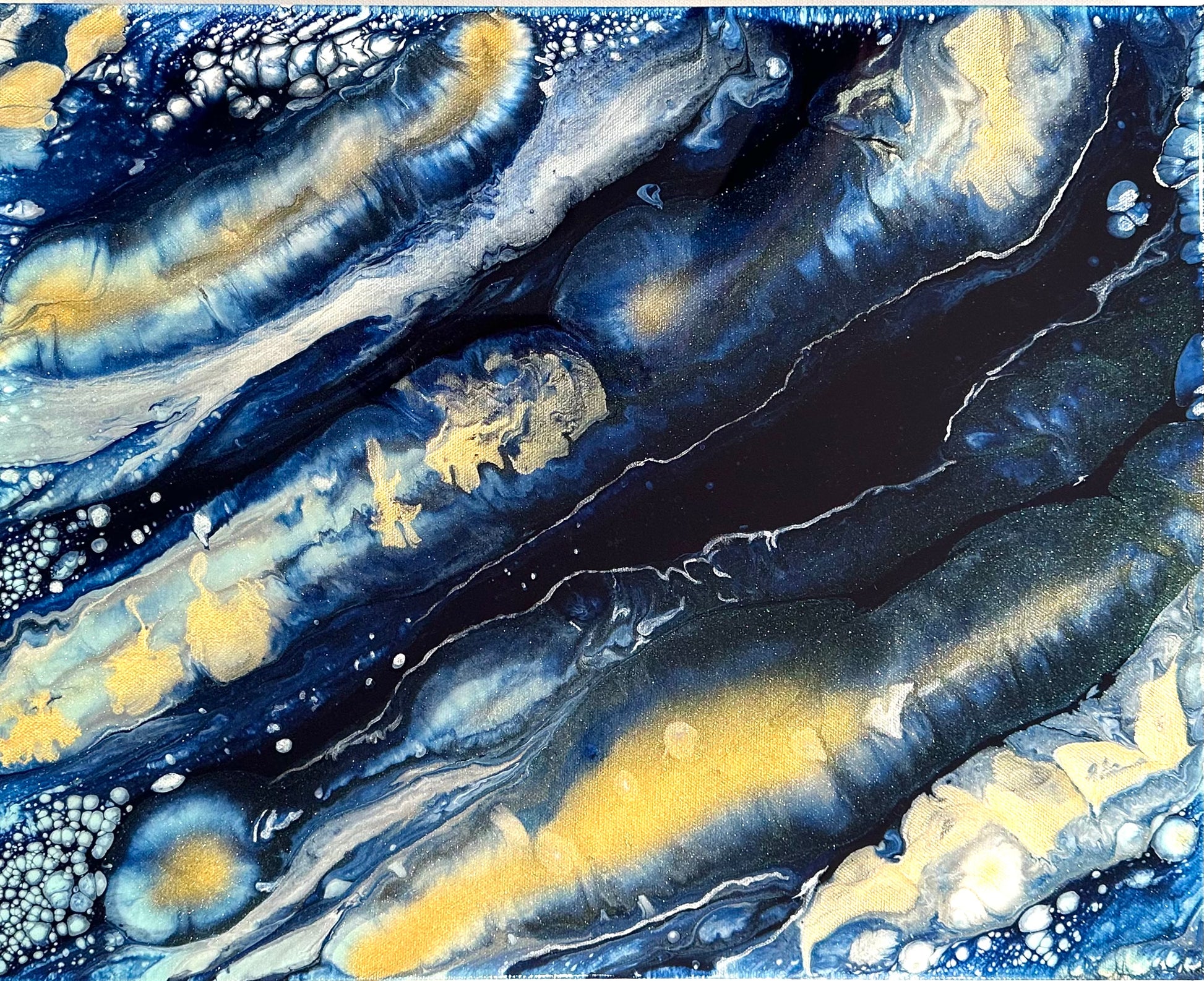 This painting is called Deep Sea because it contains the dark coolness of deep water.  Around the edges are shapes that evoke bubbles and foam.